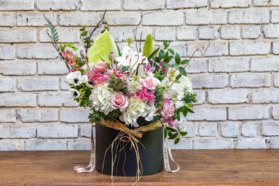 White and pink artificial flower hat box