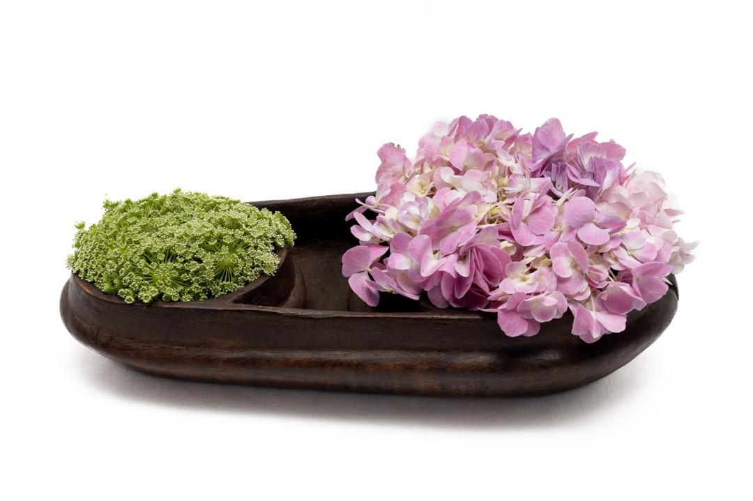 Canoe-shaped sculptural floral vessel