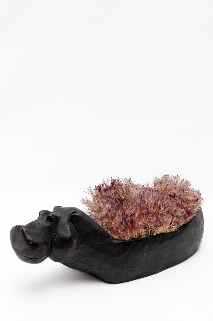 Hippo-shaped sculptural floral vessel